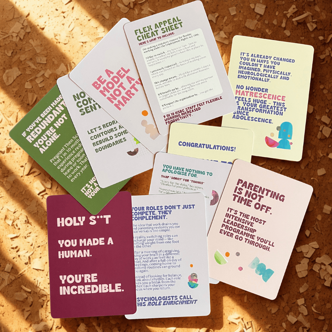 Cover Club cards spread out on a cork surface