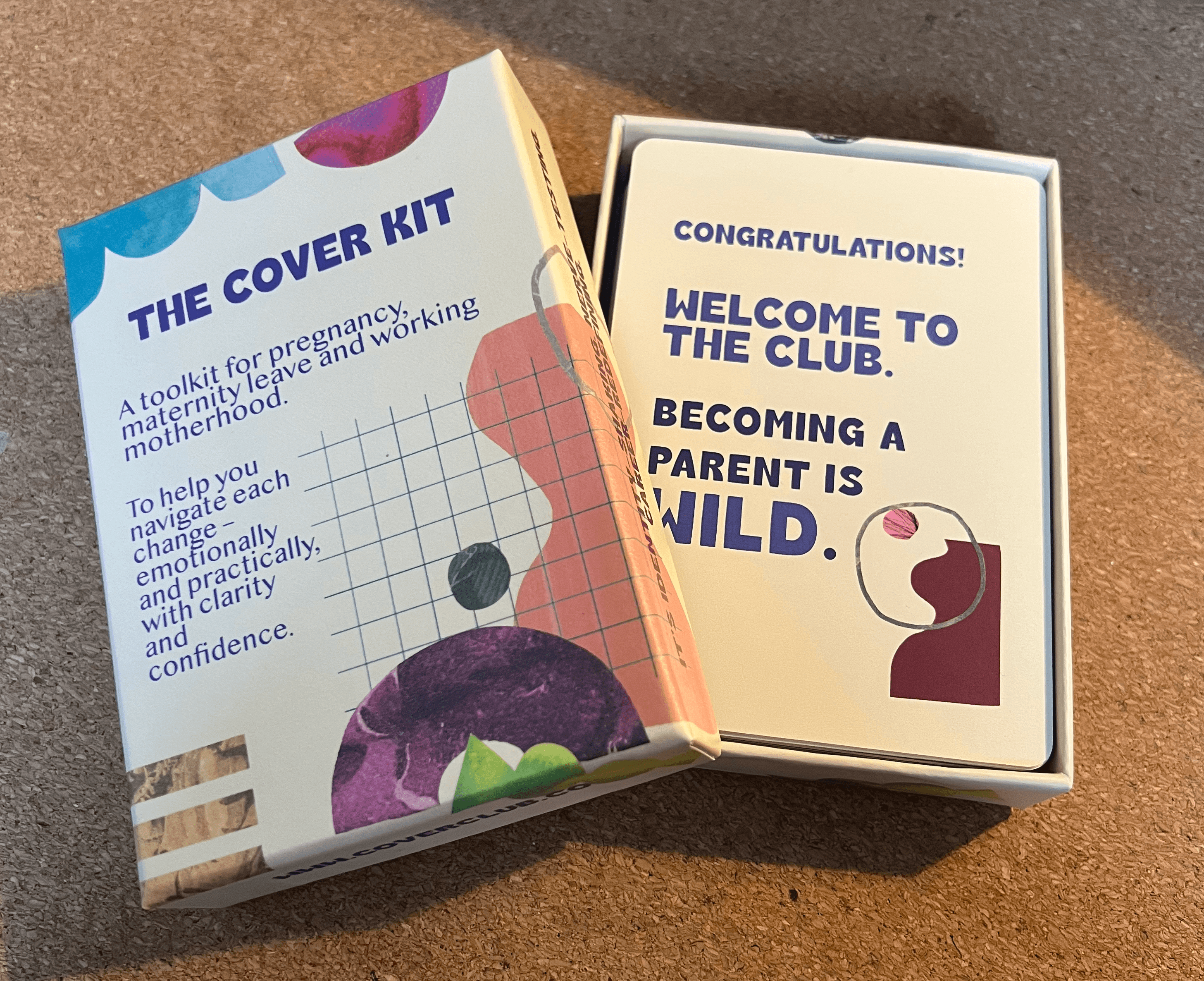 The Cover Kit box open showing the cards inside